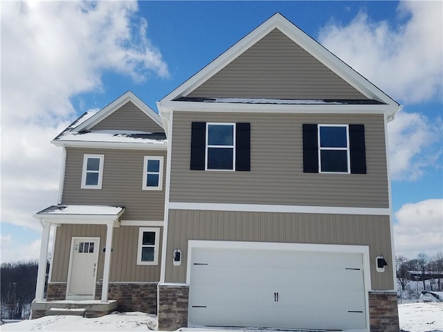 view of front of property with a garage