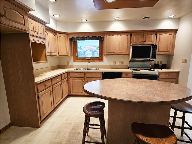 2656 Shelly Dr, White Twp Ind, PA 15701 - kitchen with a breakfast bar, light countertops, dishwasher, electric stove, and a sink