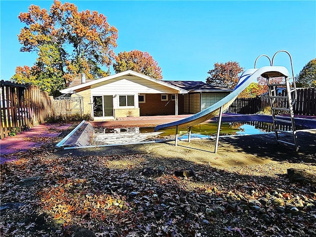 2656 Shelly Dr, White Twp Ind, PA 15701 - view of playground featuring a patio area and a fenced backyard