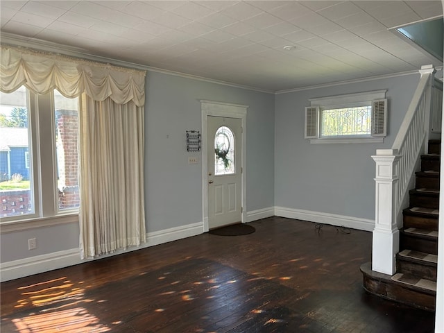 entryway with crown molding and dark wood-type flooring