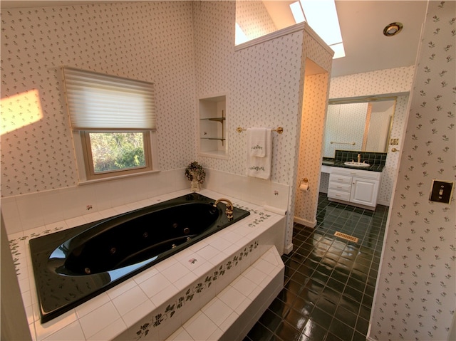 bathroom with vanity, shower with separate bathtub, and tile patterned flooring