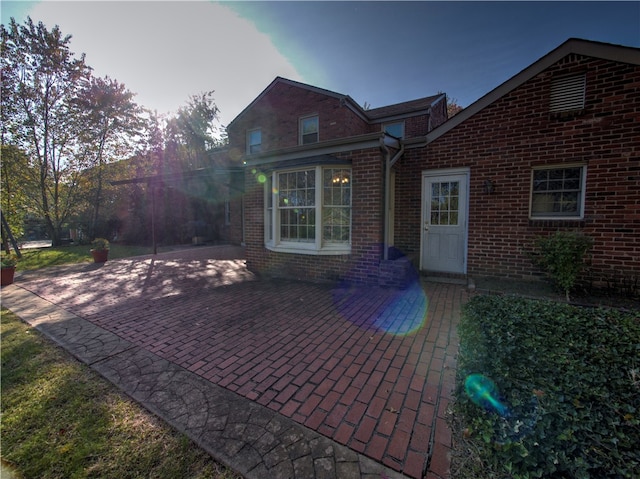 rear view of property with a patio