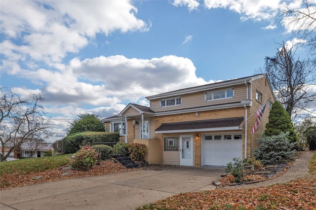 split level home featuring a garage