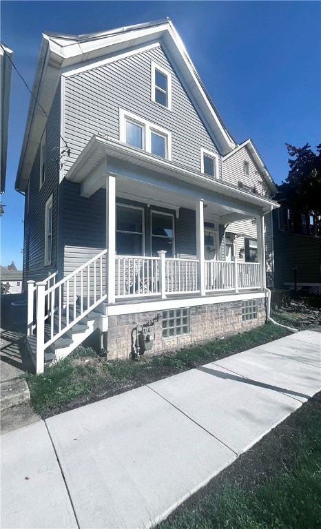 view of front of home featuring covered porch