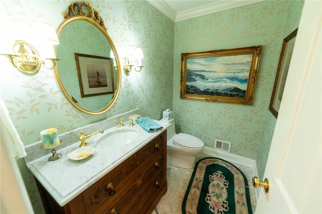 bathroom with toilet, crown molding, and vanity