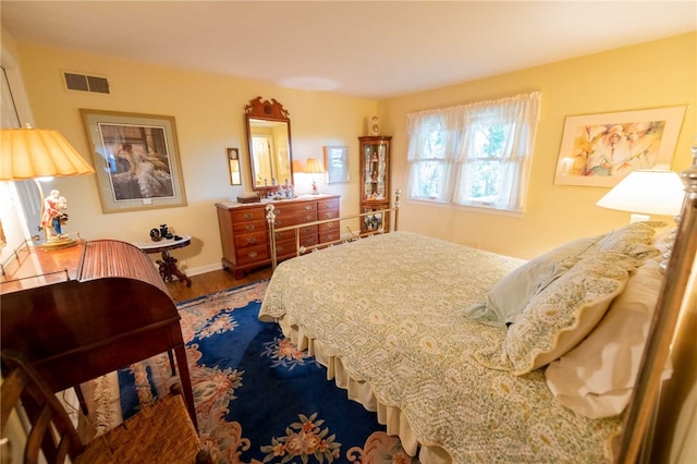 bedroom featuring wood-type flooring