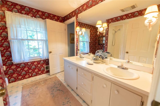 bathroom with vanity and tile patterned floors