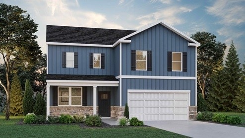 view of front facade with a front yard and a garage