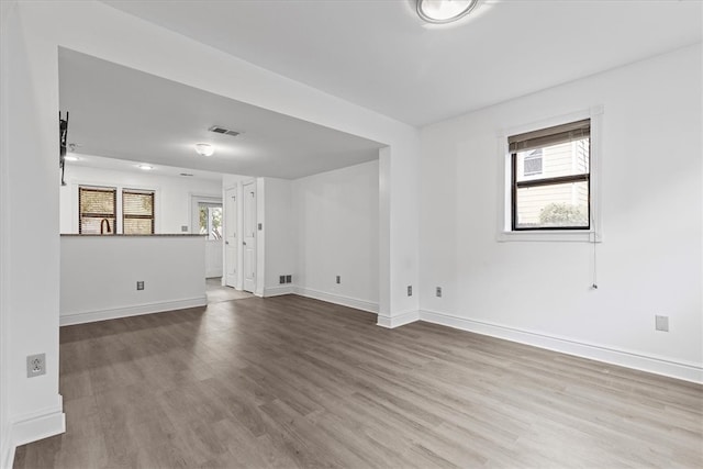 spare room featuring light hardwood / wood-style floors