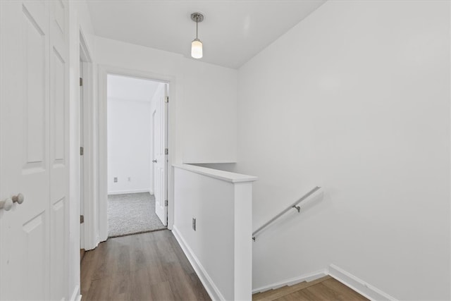 corridor featuring hardwood / wood-style floors