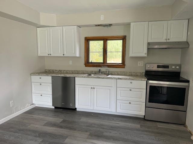 kitchen with sink, white cabinetry, stainless steel appliances, and dark hardwood / wood-style flooring