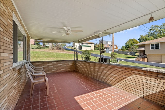 view of patio featuring ceiling fan