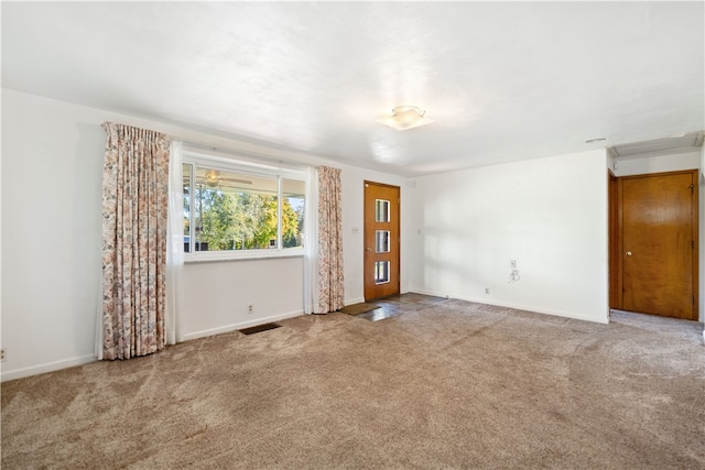 unfurnished room with carpet