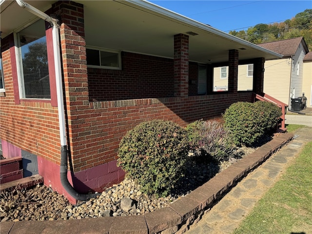 view of home's exterior featuring cooling unit