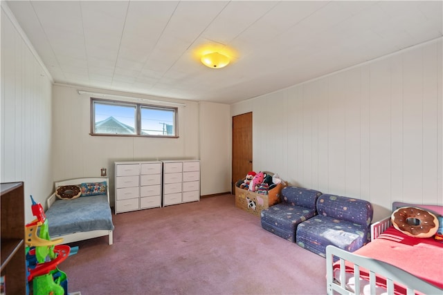 game room featuring wood walls and carpet