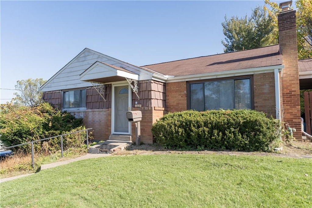 10804 Highpoint Dr, Penn Hills, PA 15235 - view of front of house with a front lawn