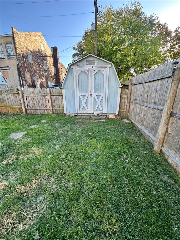 view of outdoor structure with a lawn