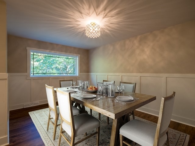 dining room with dark wood-type flooring