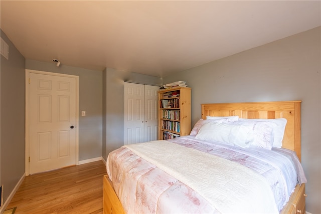 bedroom with light hardwood / wood-style flooring