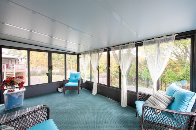 sunroom / solarium featuring plenty of natural light