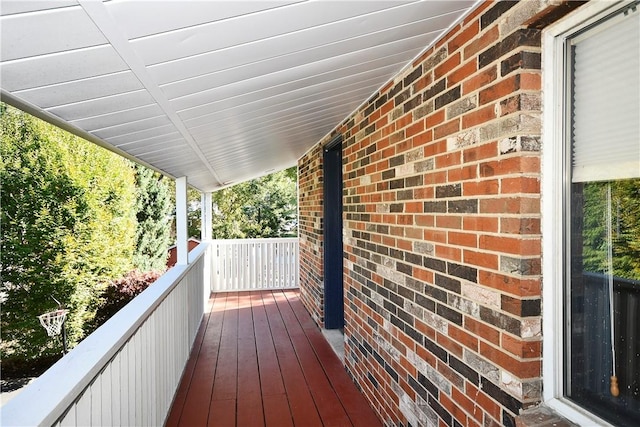 wooden terrace featuring a porch