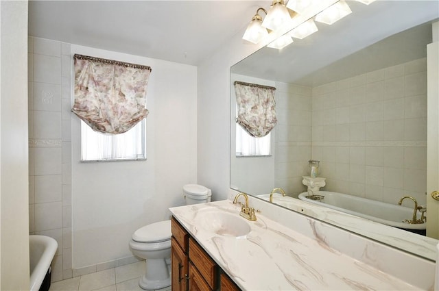 bathroom with tile patterned flooring, a bath, plenty of natural light, and toilet