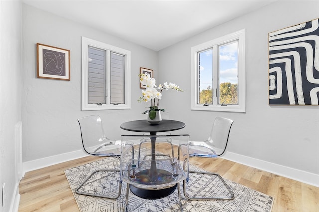 dining area featuring hardwood / wood-style floors