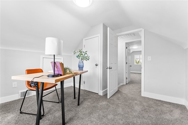 home office with carpet flooring and vaulted ceiling