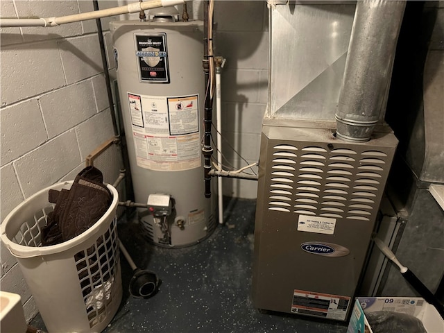 utility room featuring water heater and heating unit