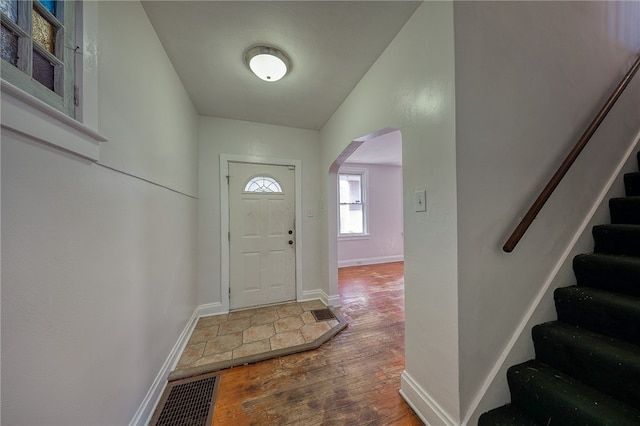 foyer with dark wood-type flooring