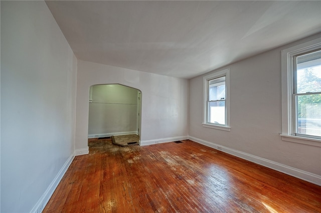 spare room featuring hardwood / wood-style floors