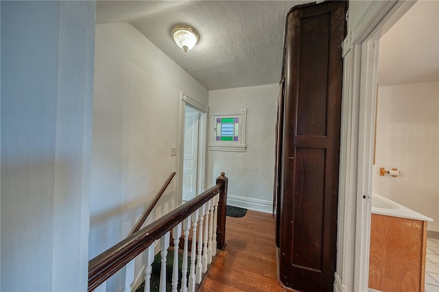 hallway featuring dark hardwood / wood-style floors