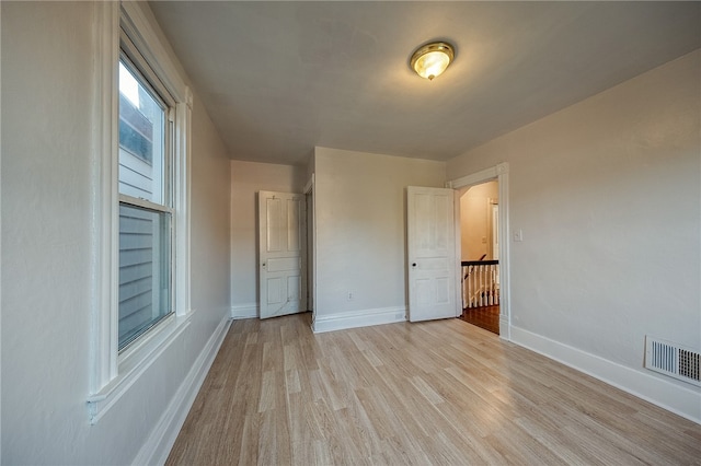 unfurnished bedroom featuring light hardwood / wood-style floors