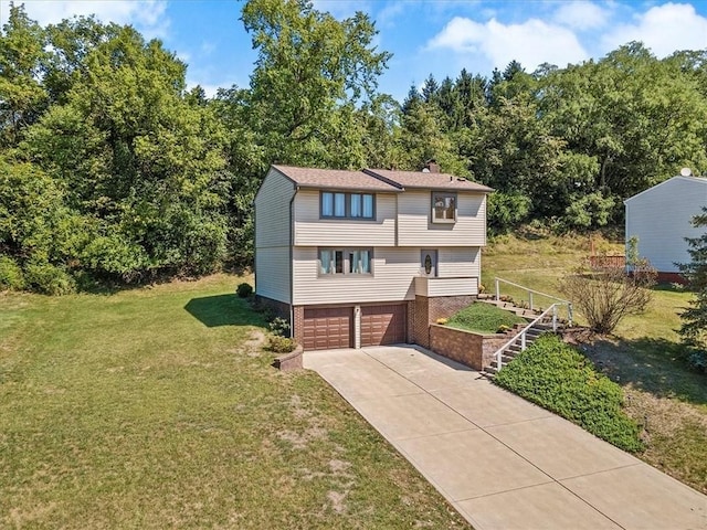 view of front of home featuring a garage, brick siding, concrete driveway, a chimney, and a front yard