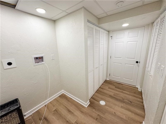 washroom featuring electric dryer hookup, wood-type flooring, and hookup for a washing machine