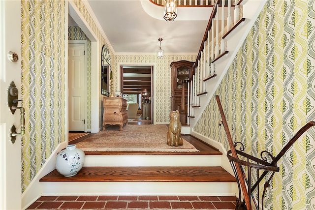 stairway with crown molding