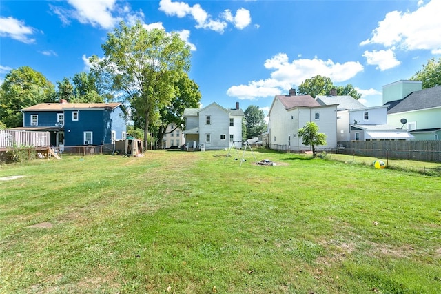 view of yard with a wooden deck