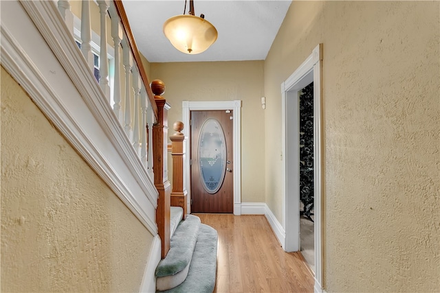 entrance foyer with light wood-type flooring