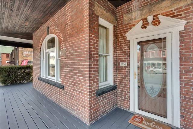 entrance to property featuring a deck