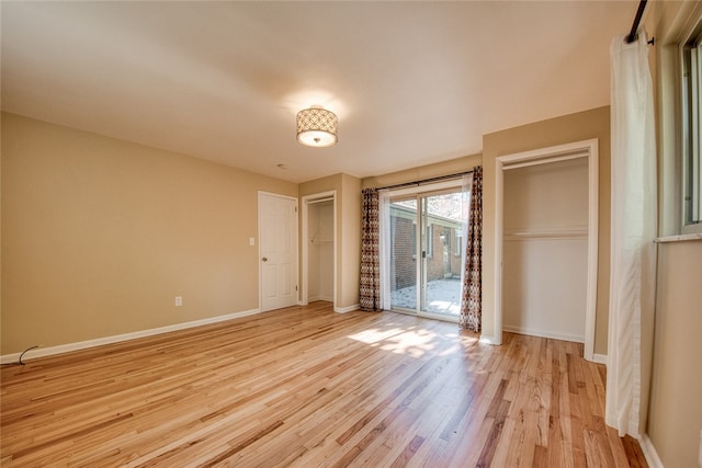 unfurnished room featuring light wood-type flooring