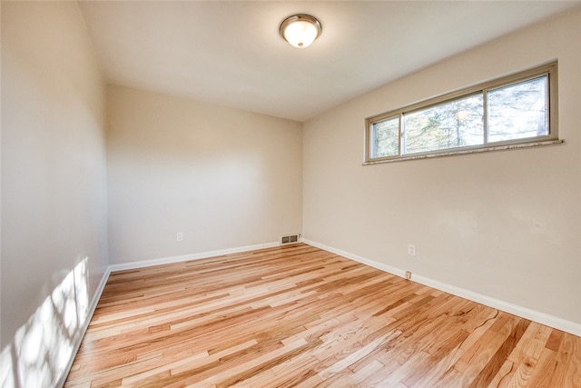 empty room featuring light hardwood / wood-style floors