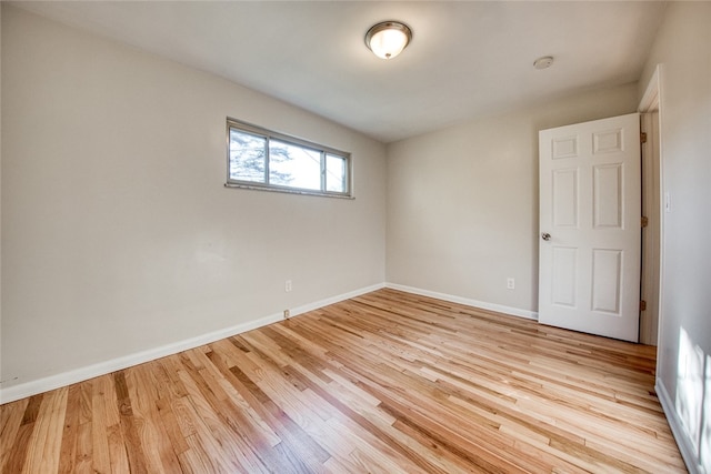 unfurnished room featuring light hardwood / wood-style flooring