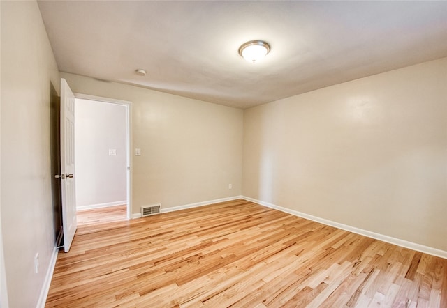 unfurnished room featuring light hardwood / wood-style flooring