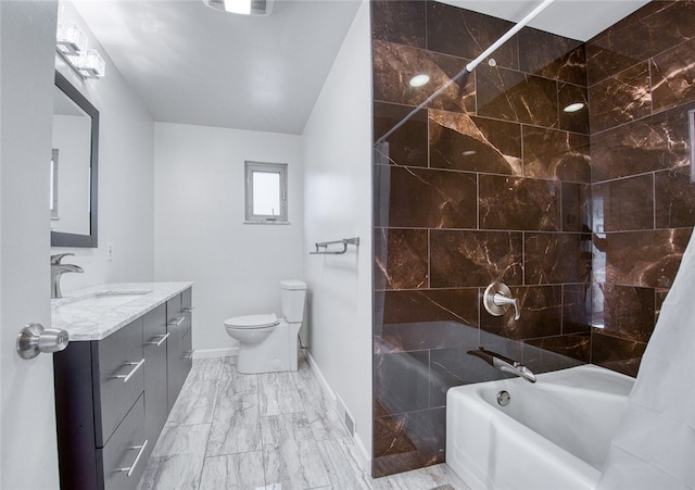 full bathroom featuring toilet, vanity, and shower / bath combination with curtain