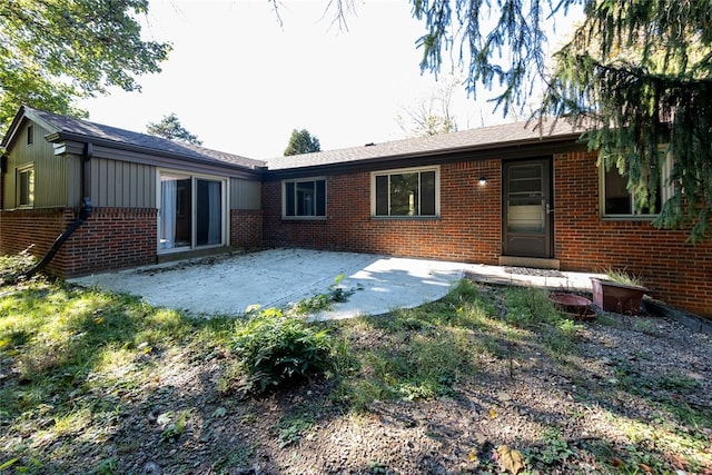 rear view of property with a patio