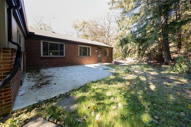 rear view of house with a patio area