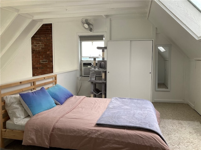 bedroom with a closet, carpet flooring, cooling unit, and vaulted ceiling