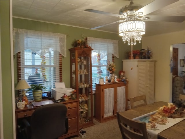 carpeted office featuring crown molding and an inviting chandelier