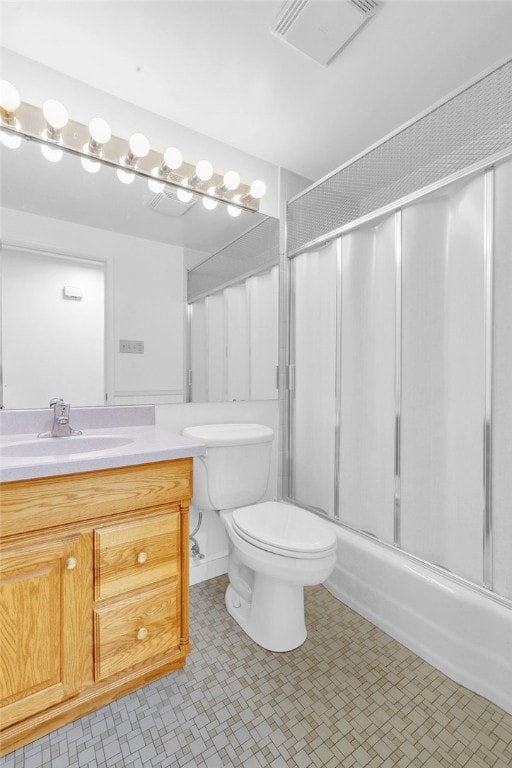 full bathroom with vanity, toilet, and enclosed tub / shower combo