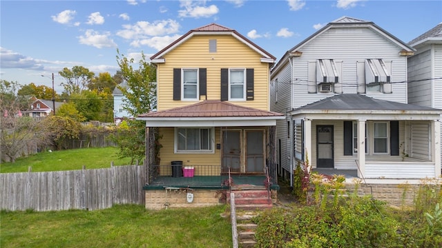 view of front property with a front yard and a porch